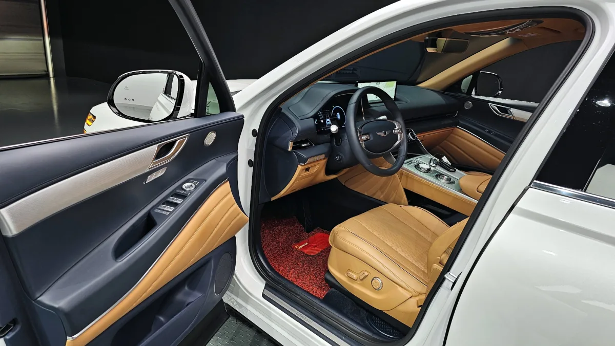 Genesis GV80 interior through the open door