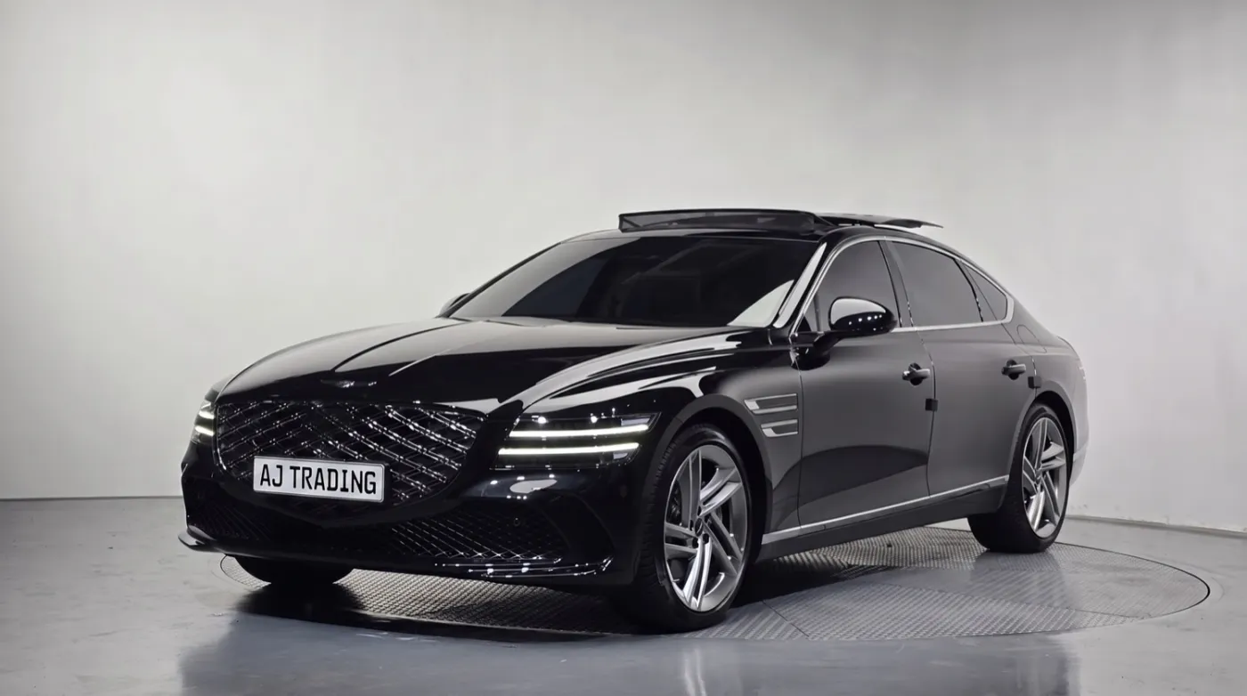A black Genesis G80 sourced from Korea by AJ Trading