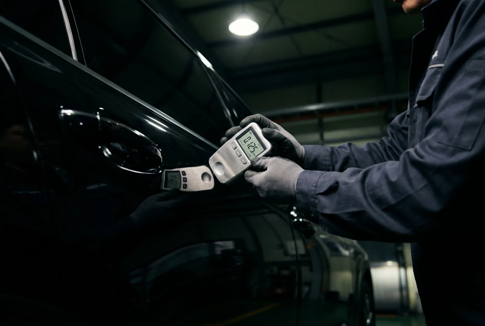 An AJ Trading inspector checking a car in Korea before purchase